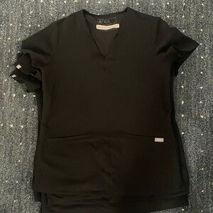 Figs woman’s black casma three pocket scrub top. X-small